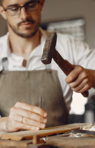 woodworker with hammer